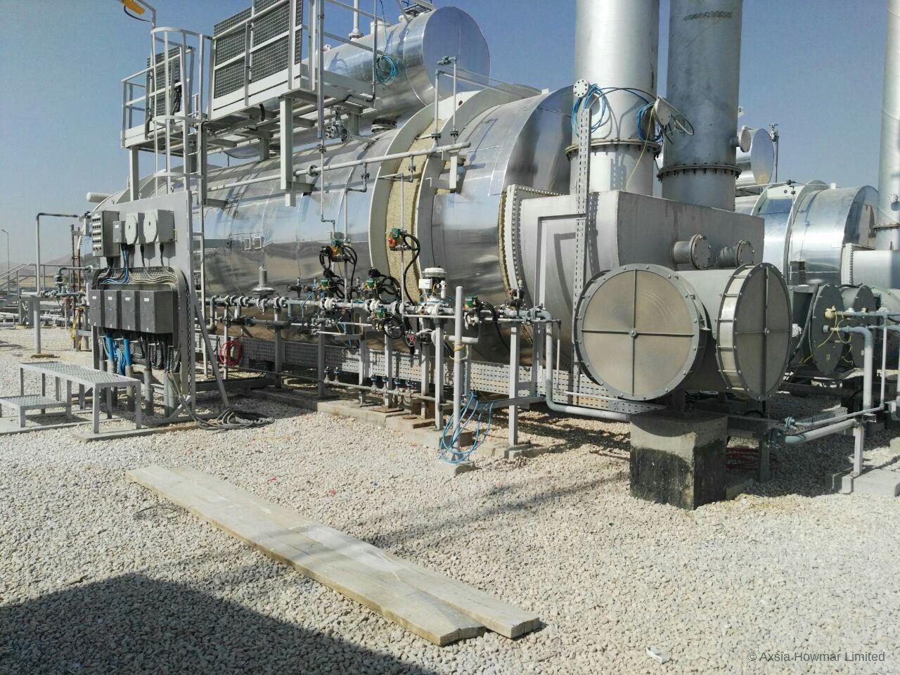 Skid-mounted indirect fired heater package installed and operating.